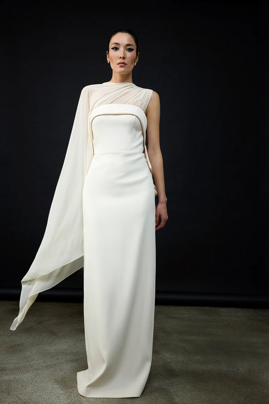 فستان سهرة طويل مزوّد بوشاح من التول وتفصيل فيونكة خلفية